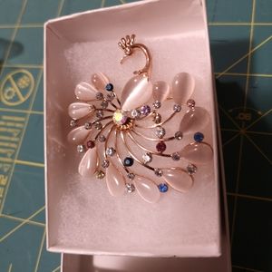 Pink peacock pin